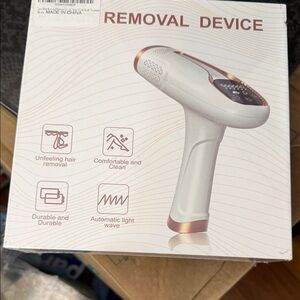 White and Gold Hair Removal Device